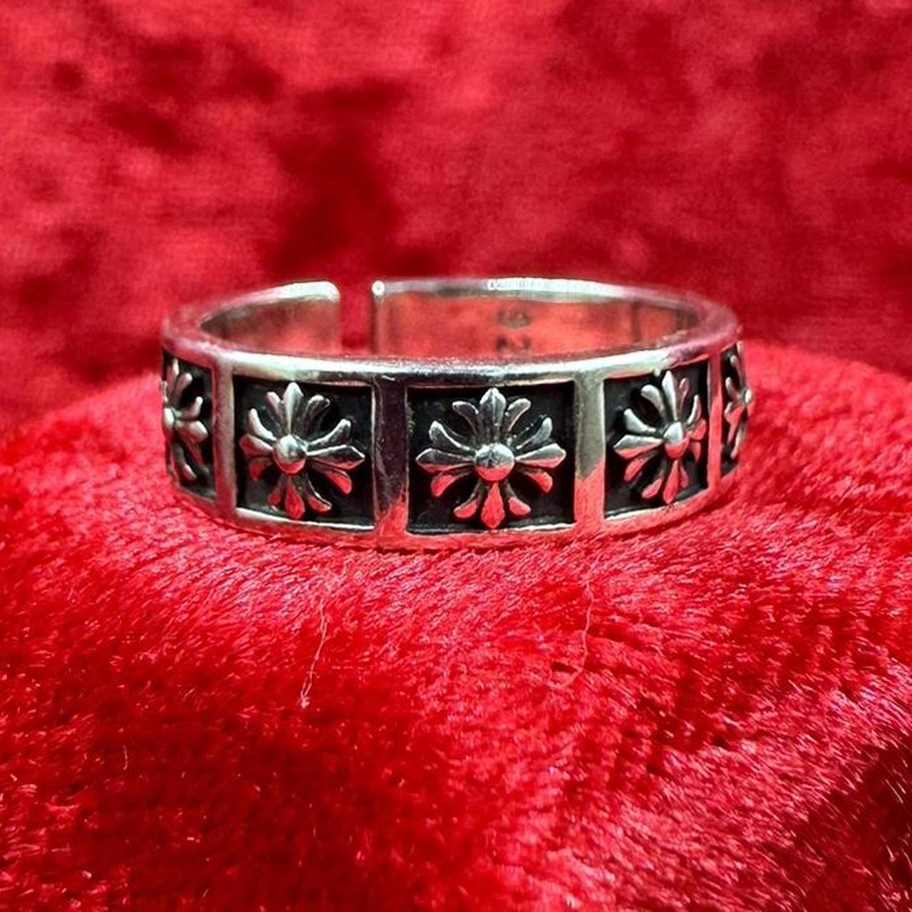 Silver and black tribal cross band ring... - Depop