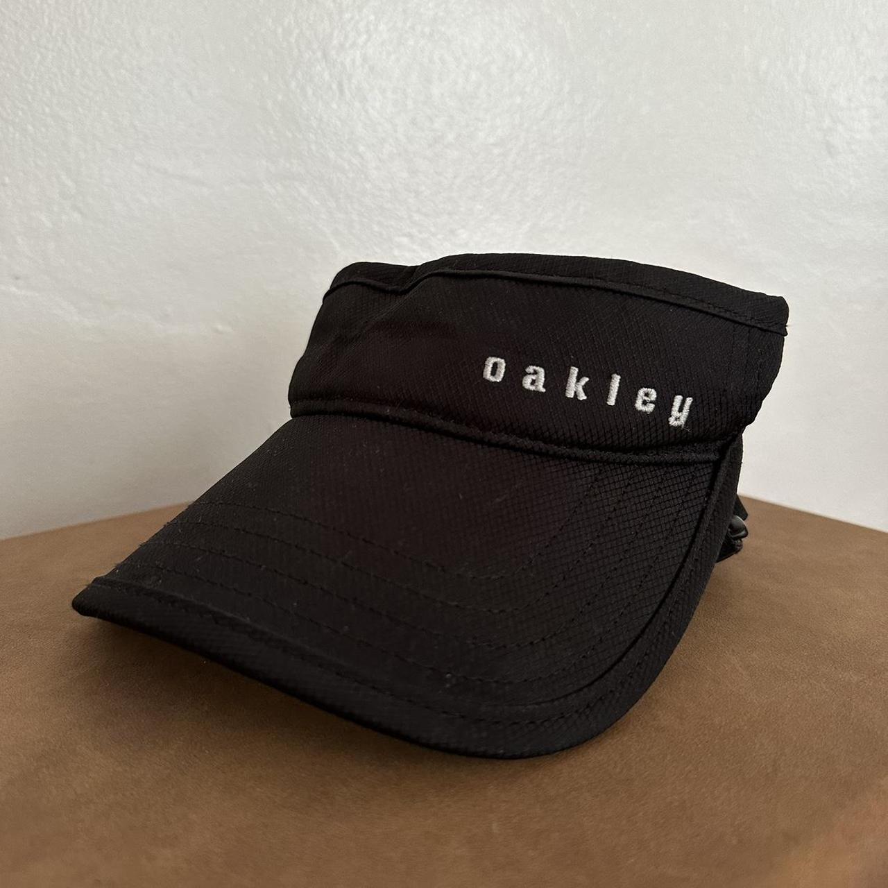 Black OAKLEY visor cap Good condition oakley Depop
