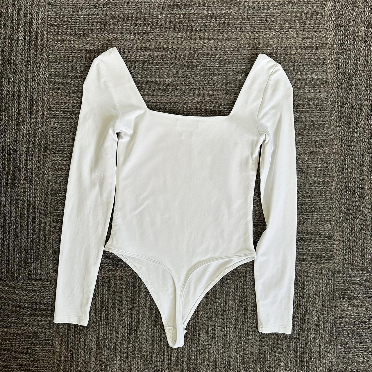 Aritzia bodysuit. babaton contour bodysuit. White - Depop