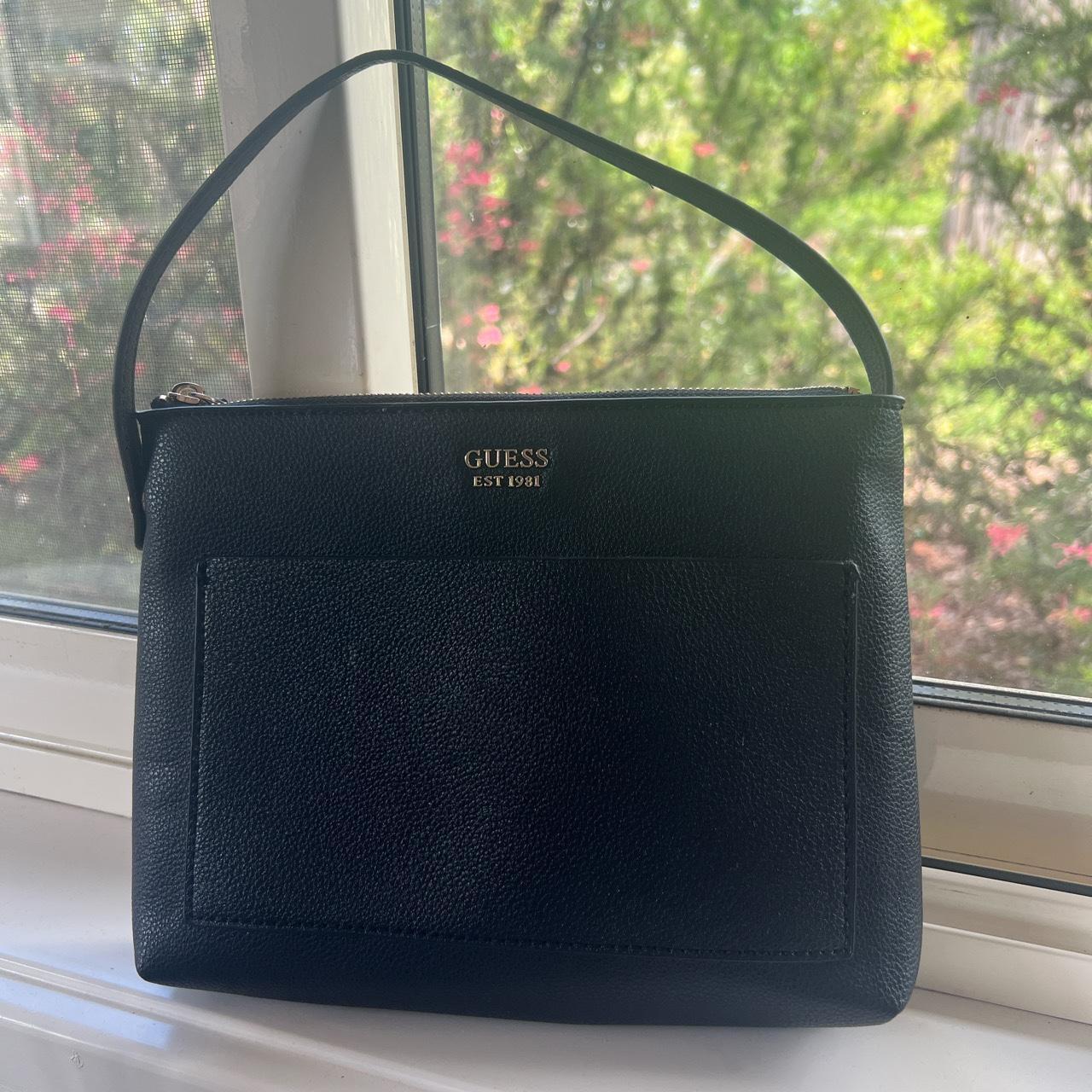 Guess clutch purse, never been used. Has a decent... Depop