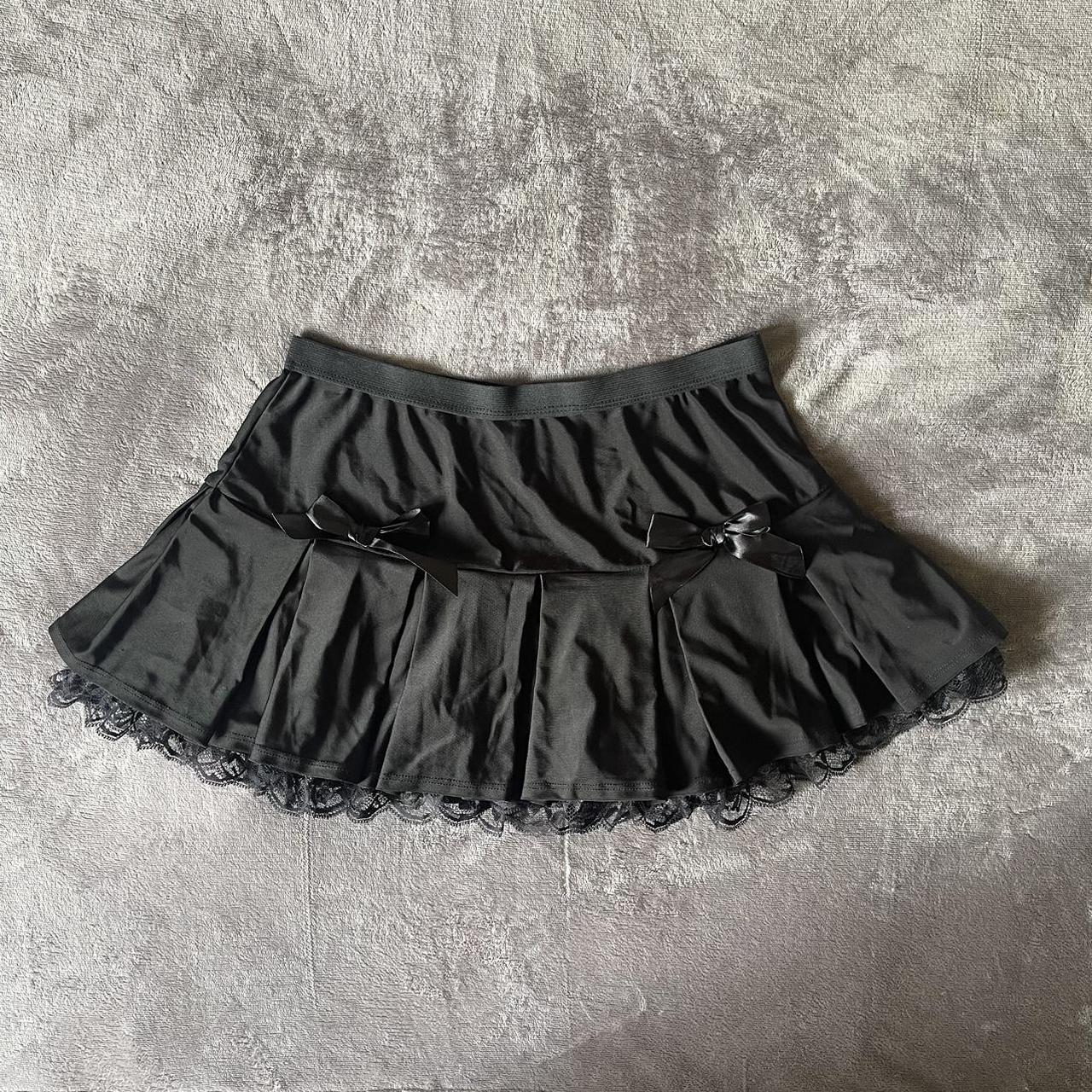 Black lace trim pleated mini skirt with bows. Has an... - Depop