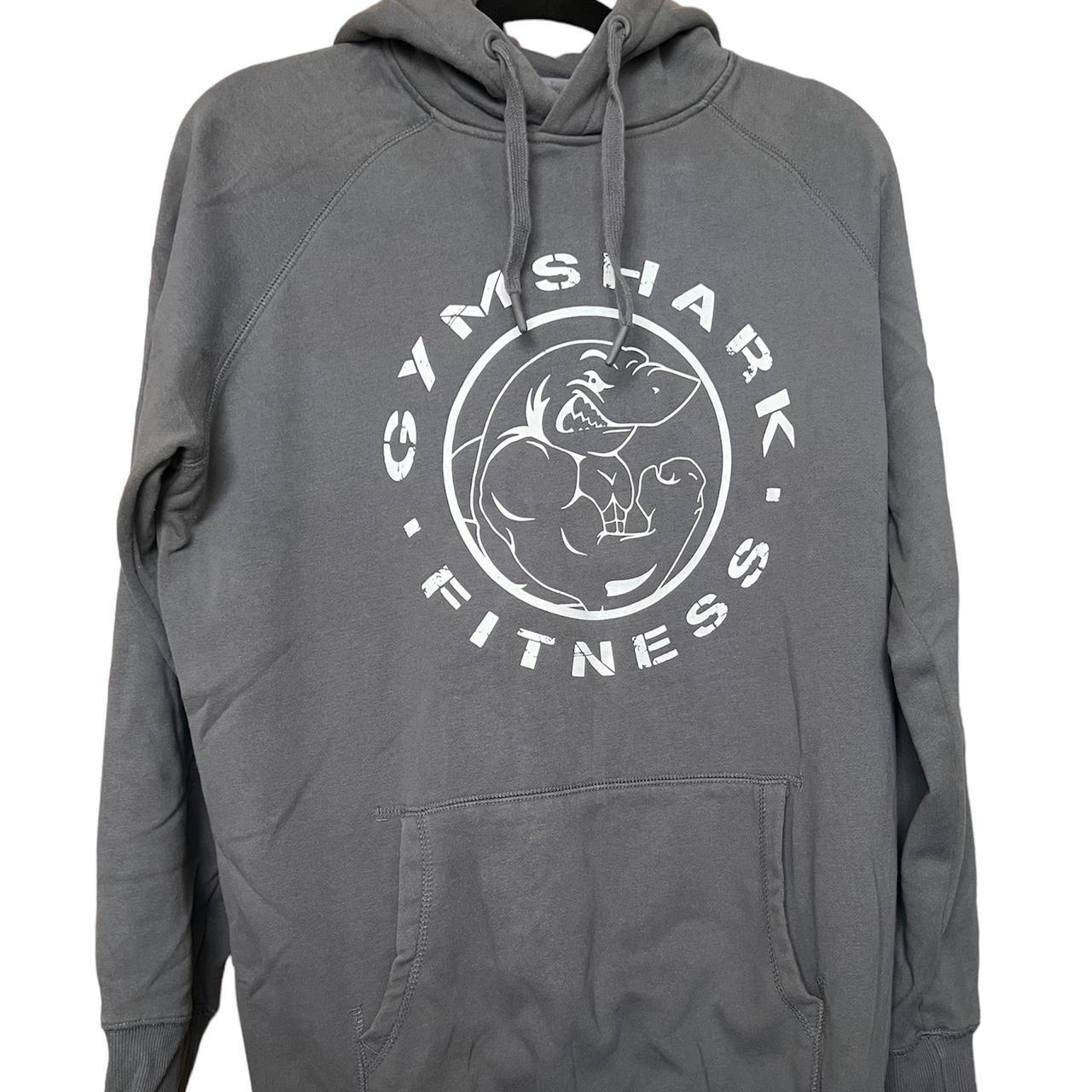 Gymshark grey hoodie with logo graphic on front.