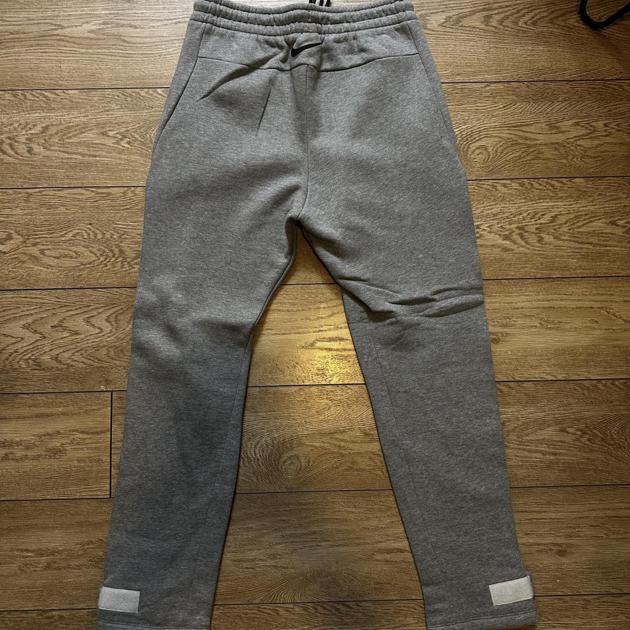 Nike Fear of God Heather Grey tear away sweatpants | Depop Nike Fear of God Heather Grey tear away sweatpants | Depop