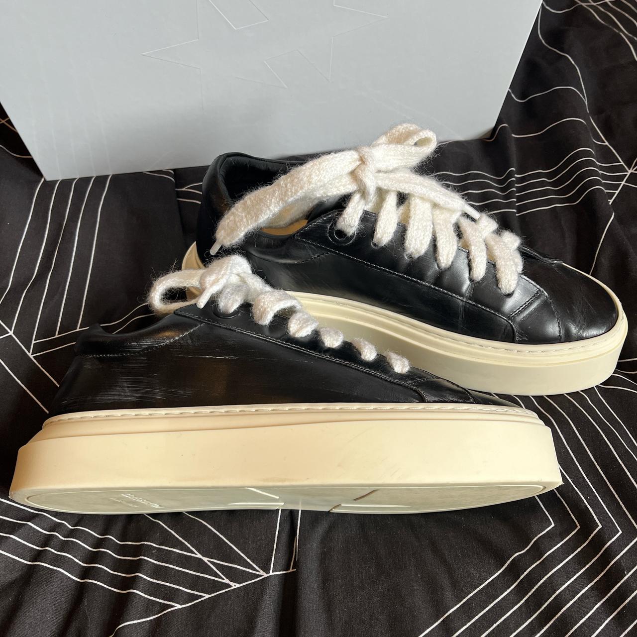 Cole Buxton the Wilson sneaker in vintage black.... Depop