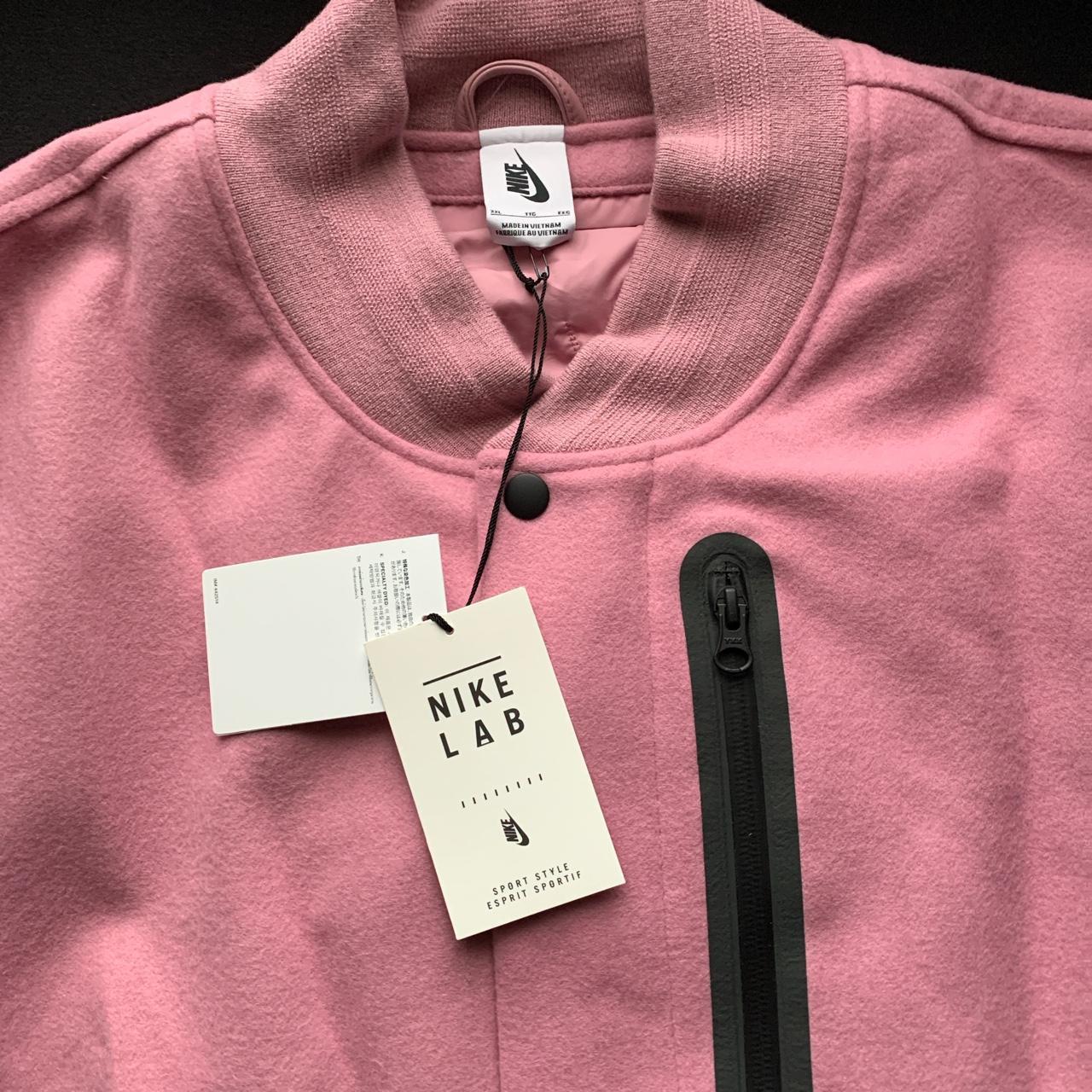 Nike pink jacket men's best sale