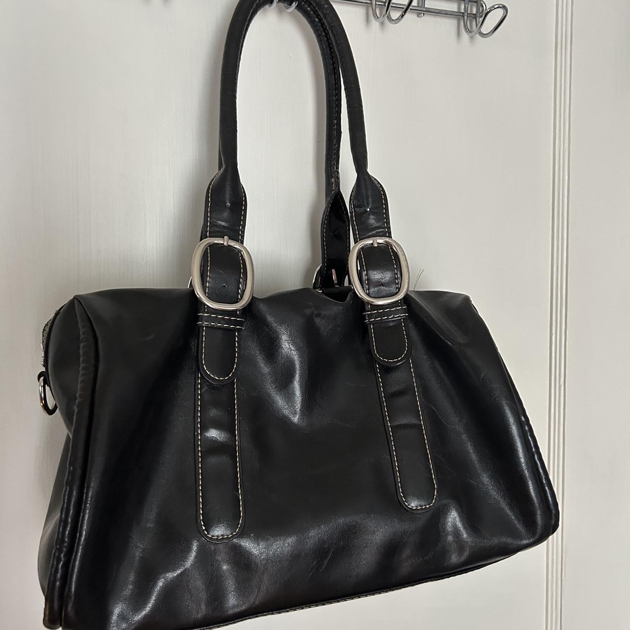 black bag looks like a bowling bag - Depop