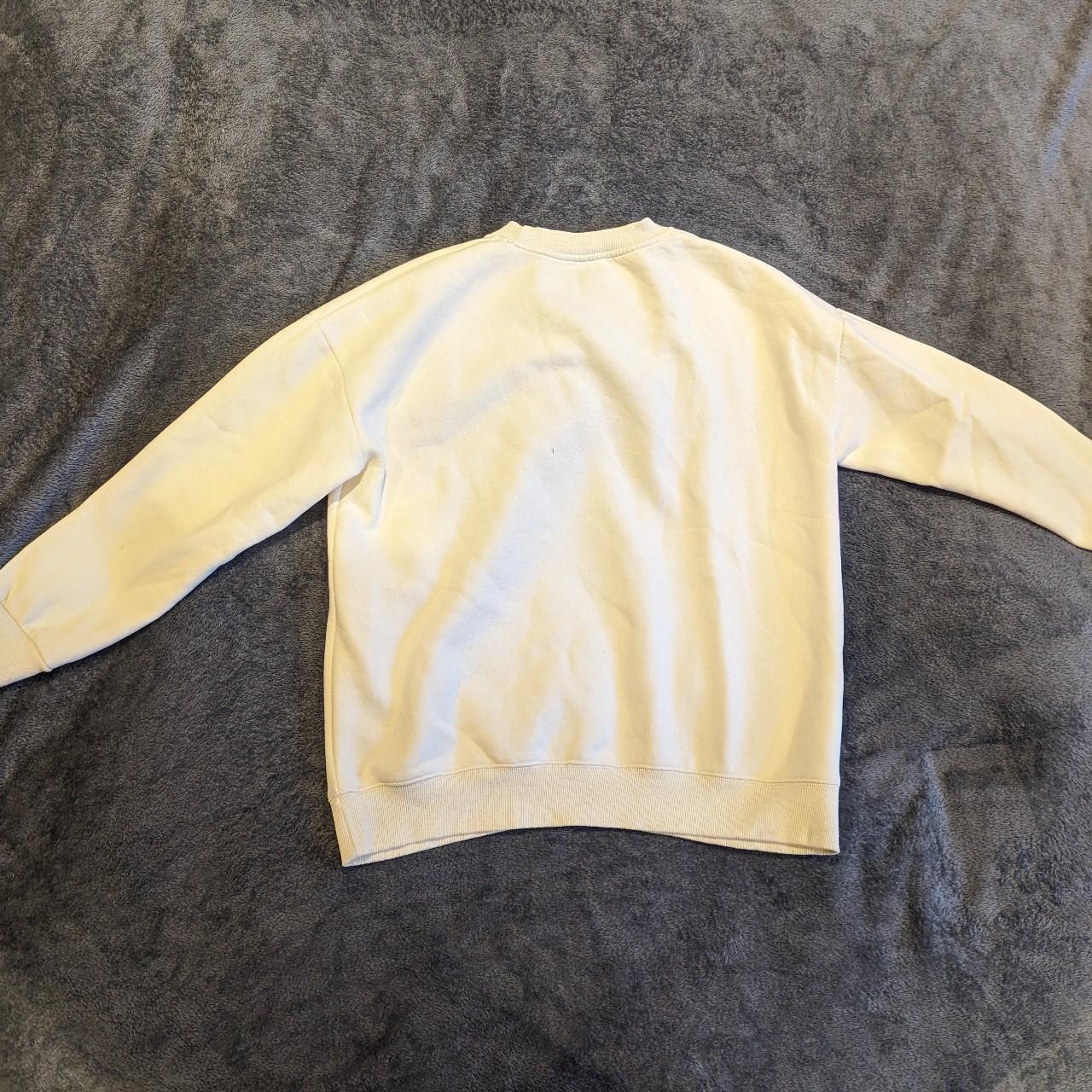 spellout nike jumper