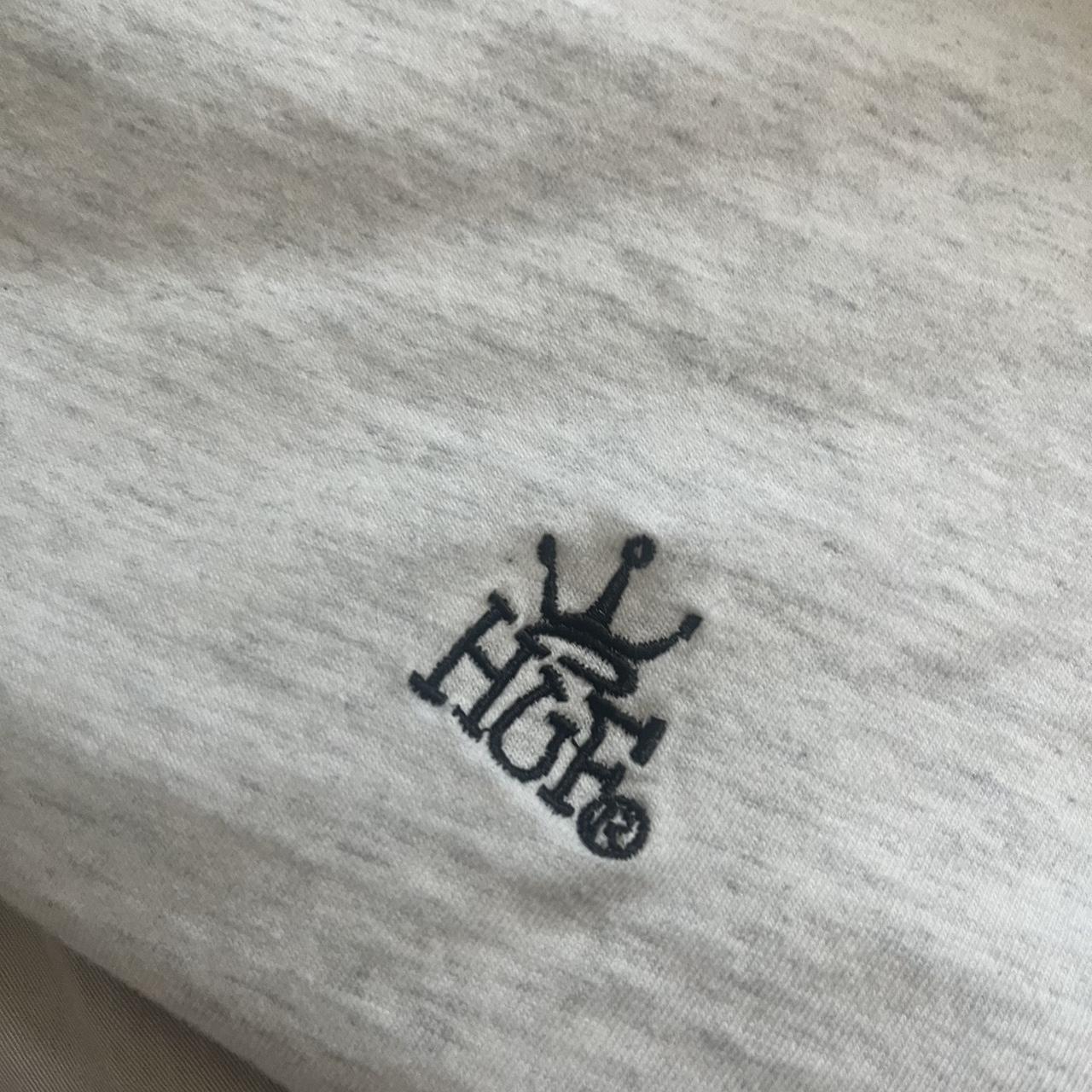 HUF white with black stitch skating shirt size M - Depop