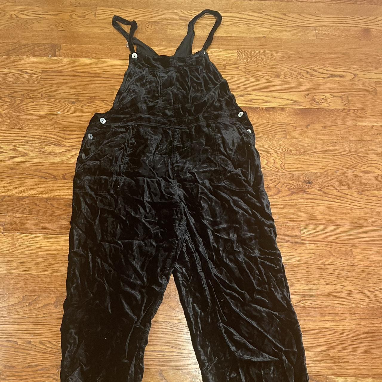 Black velvet overalls, buttons are missing on