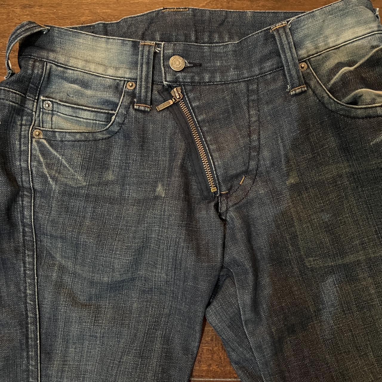Tornado mart flared jeans 32x32 with asymmetrical... - Depop