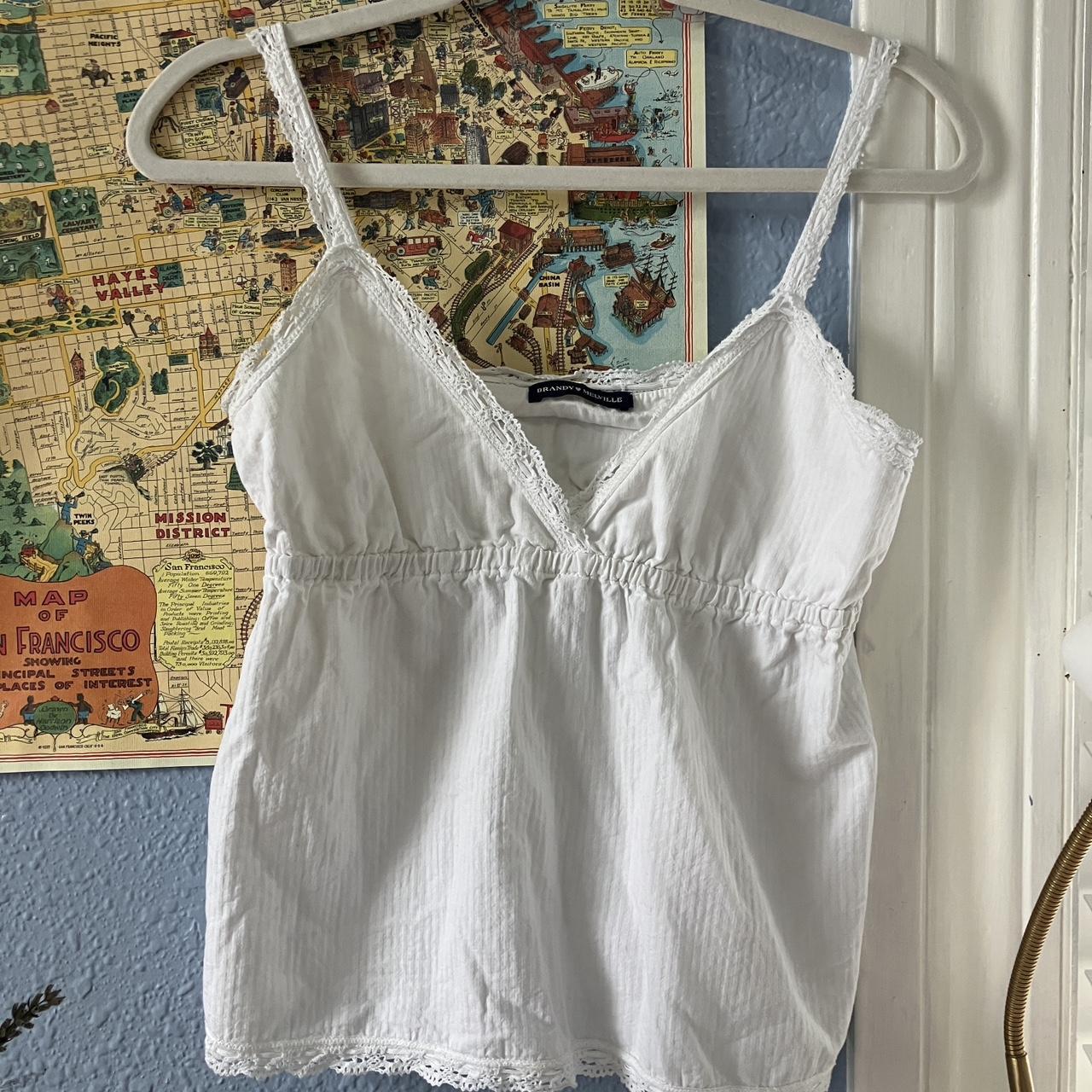 brandy melville white babydoll top- top has been... - Depop