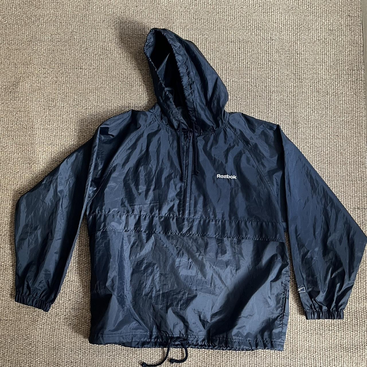 Reebok Navy Windbreaker/Raincoat. Size is L but it... - Depop