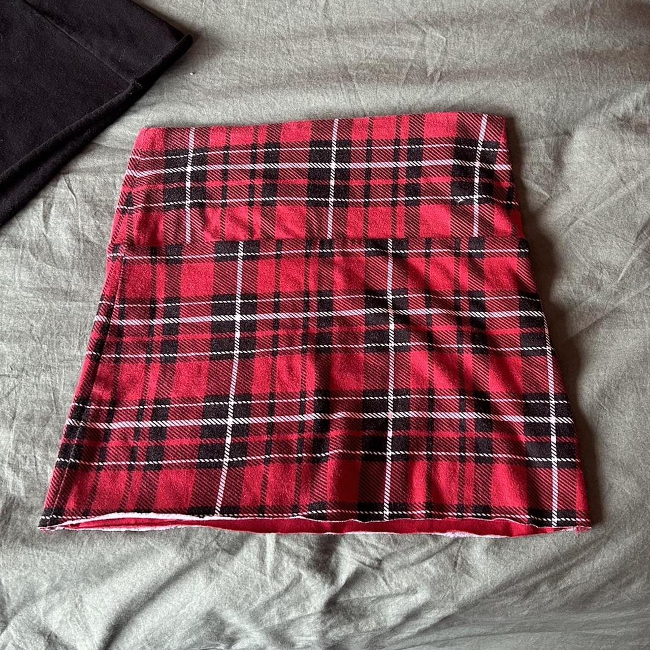 *very* mini red skirt with a raw/cut hem. size... - Depop