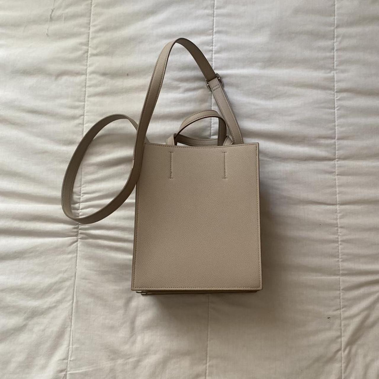 beige uniqlo sling handbag tote! - used sometimes,... - Depop