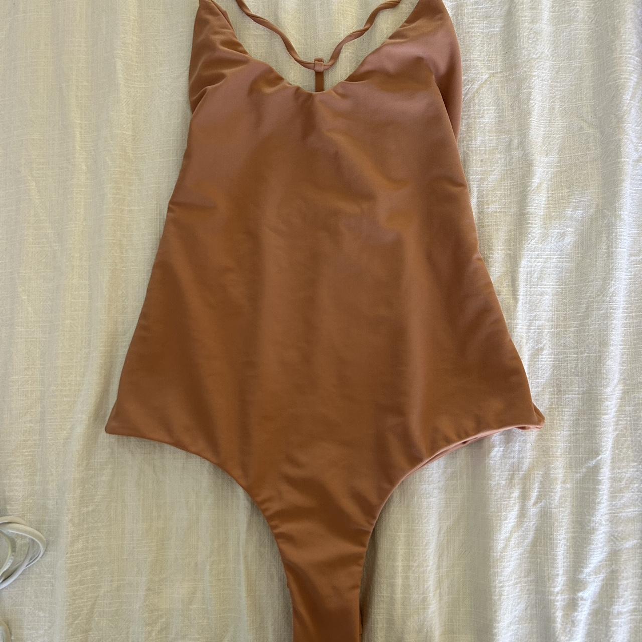 BENOA one piece size L but can fit smaller