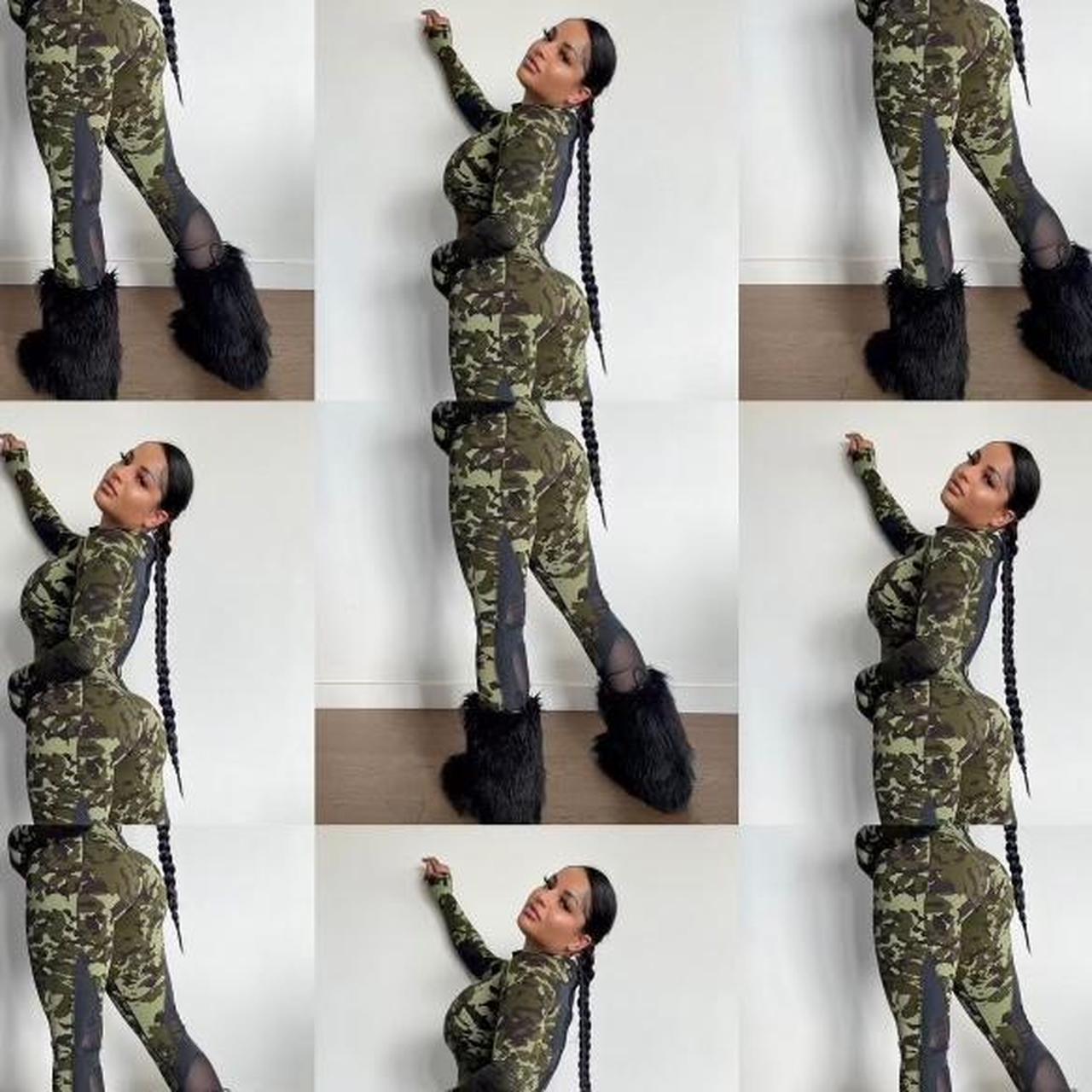 Shops nike camo jumpsuit