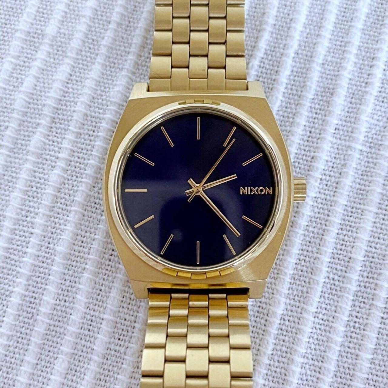 Nixon gold watch blue face best sale