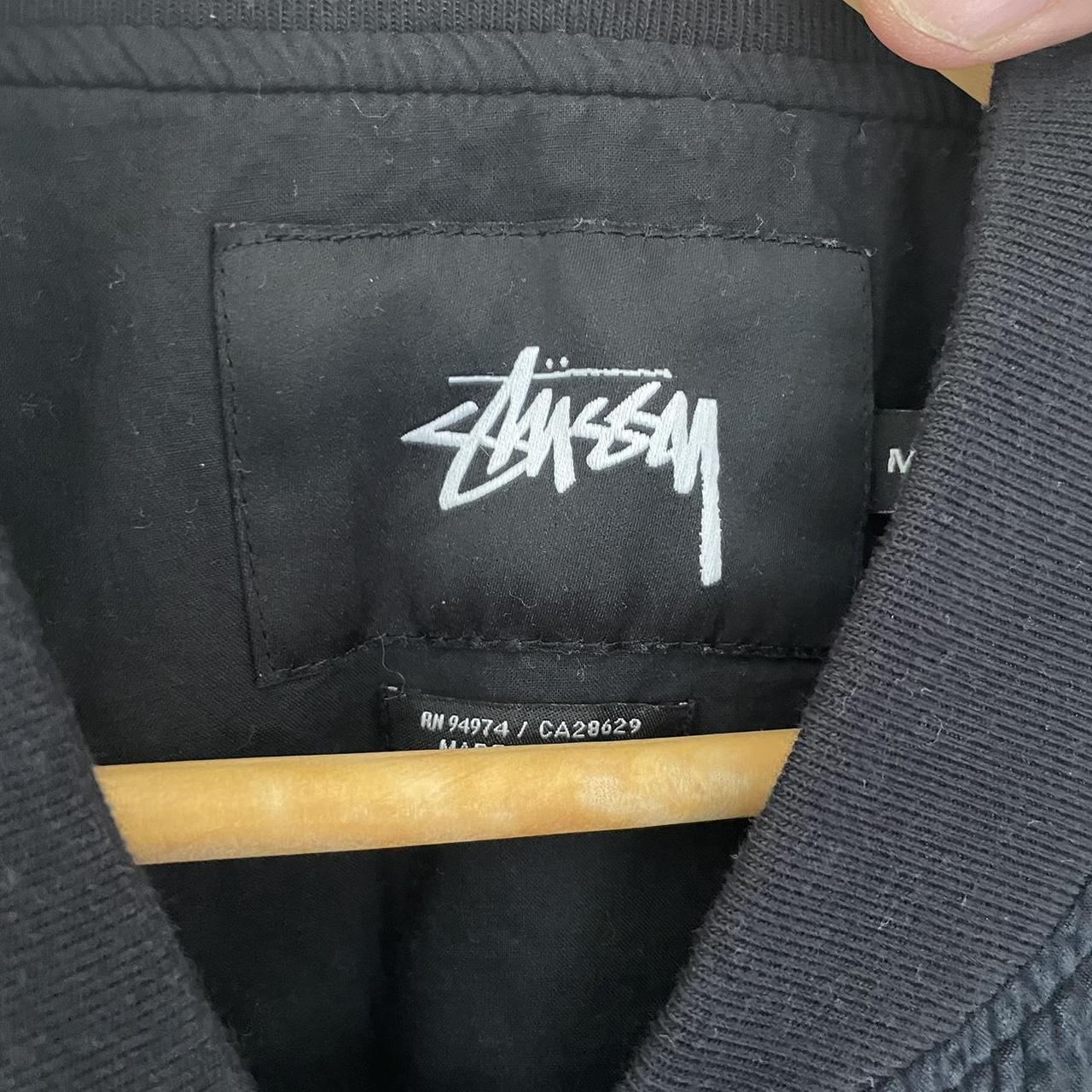 Stussy bomber jacket in black and white dot in... - Depop