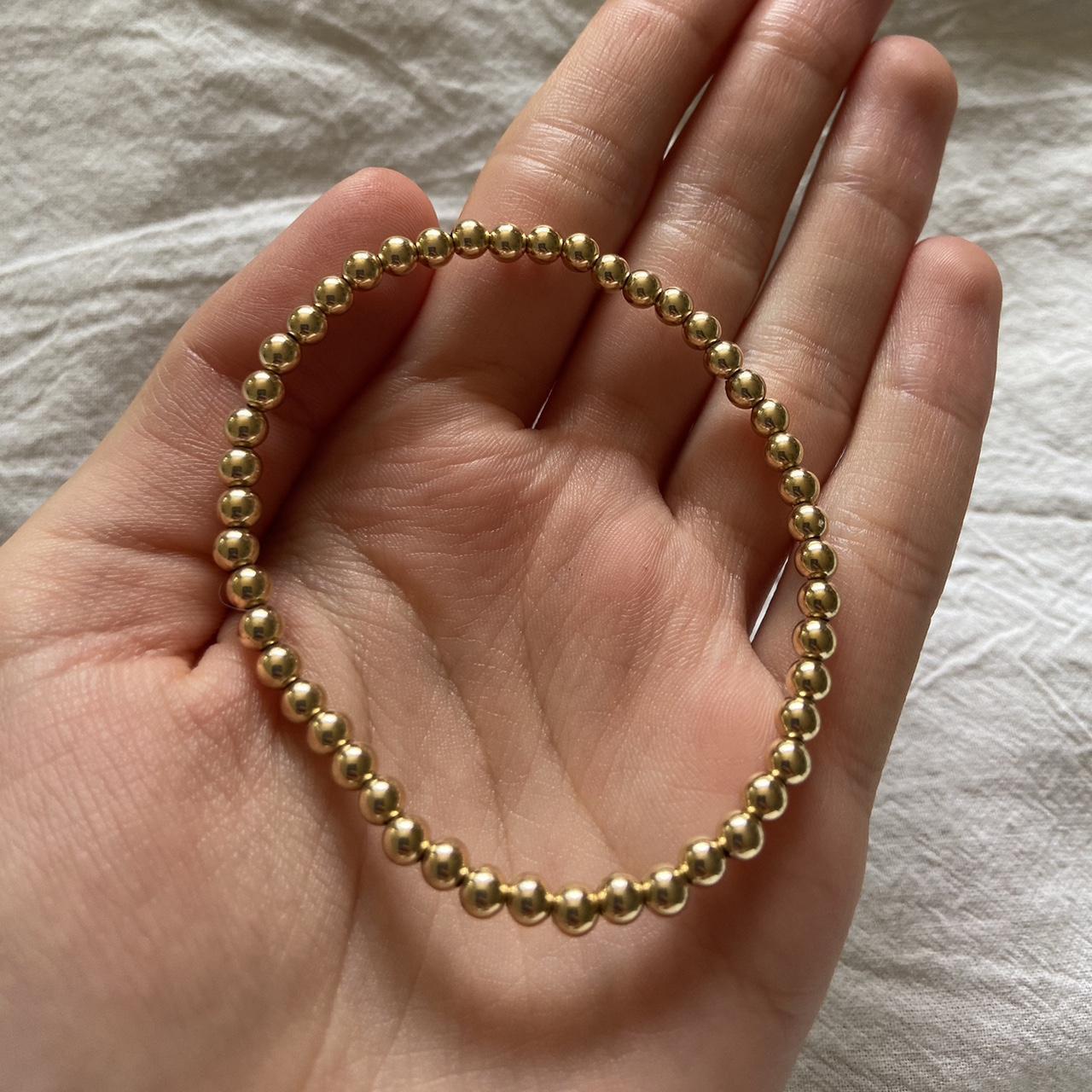 Enewton beaded gold bracelet! Too big for my wrist,... Depop
