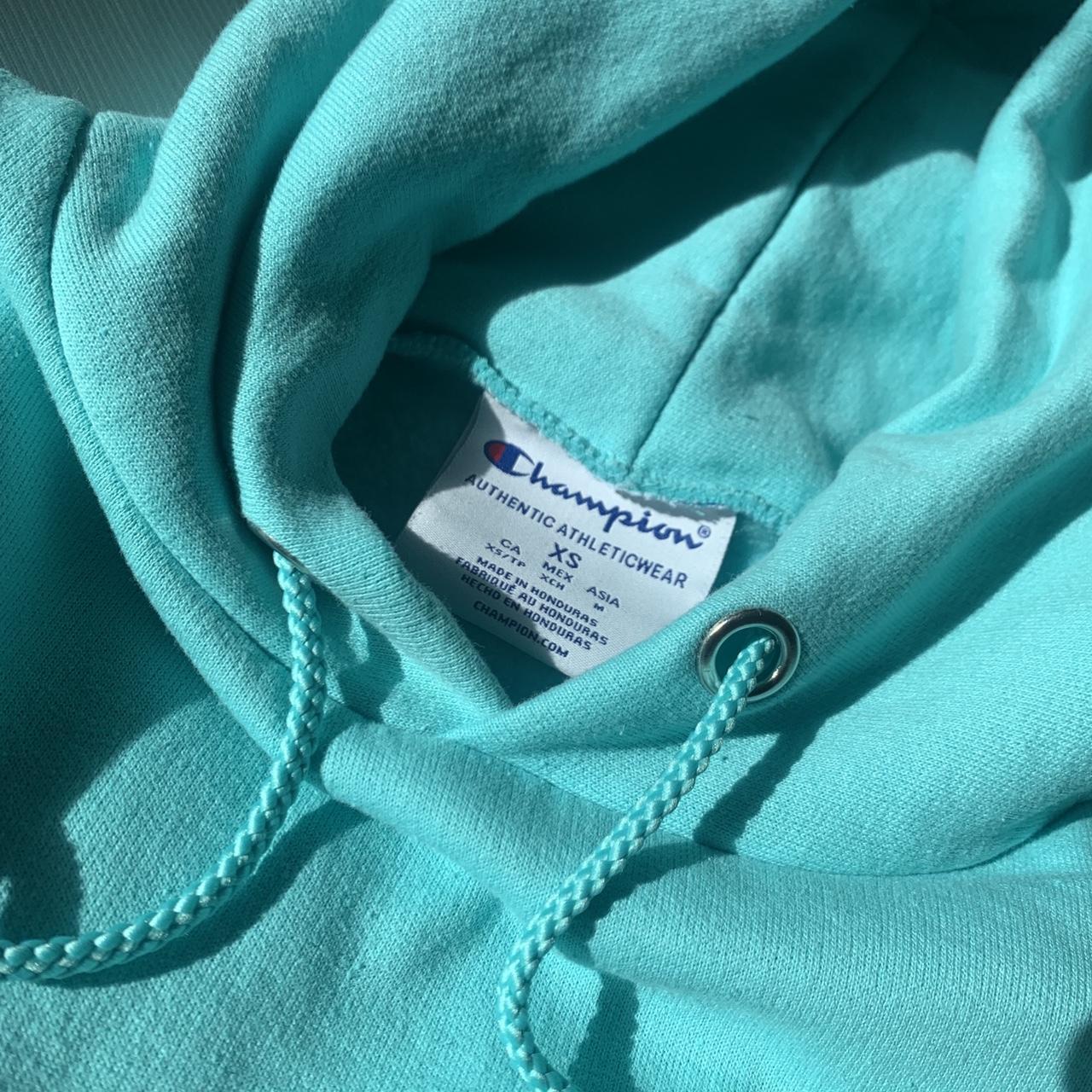 Neon Baby Blue Champion Hoodie Tight fitting on a