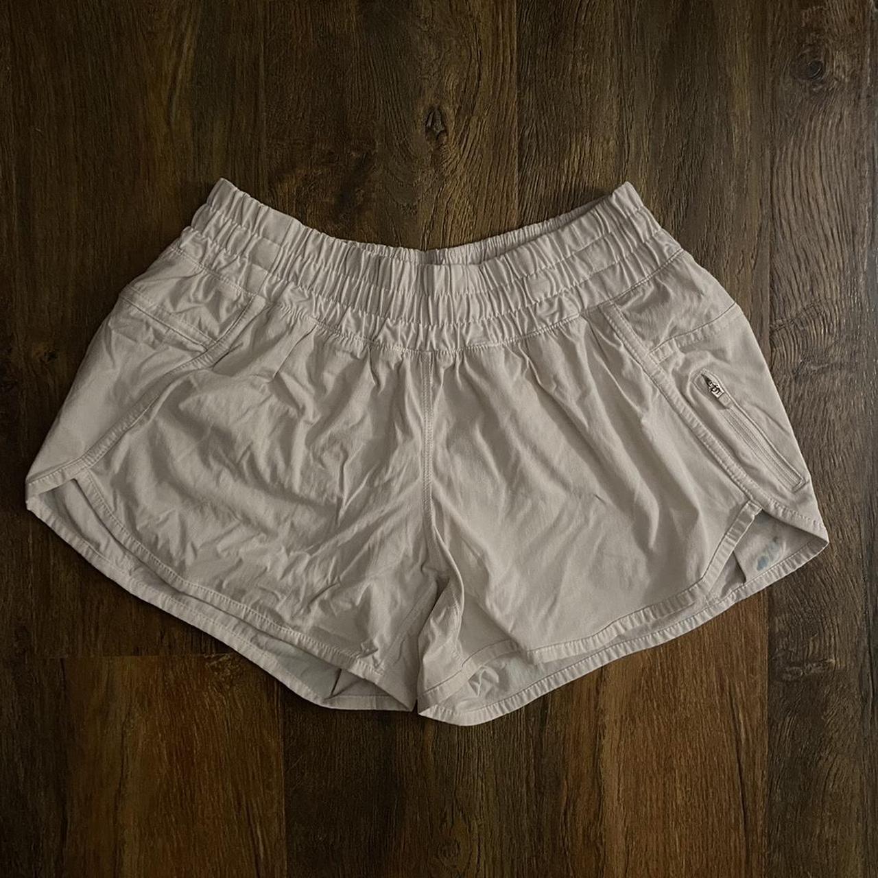 White Lululemon 4 inch shorts in good condition but - Depop