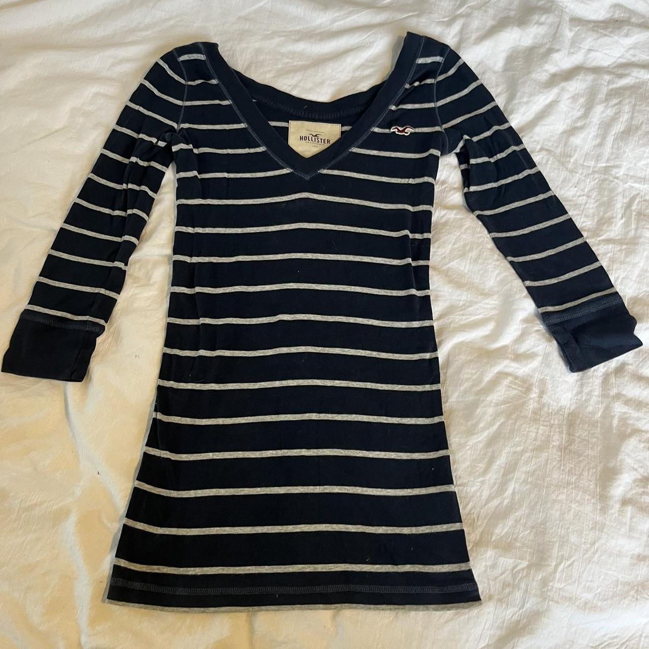cute navy and grey v-neck Hollister too open to... - Depop