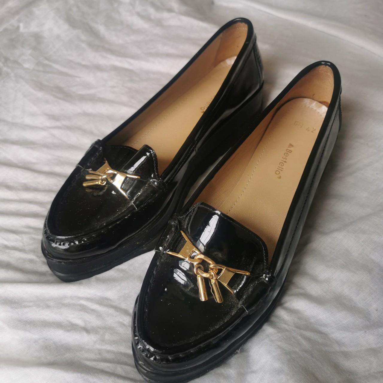 Chunky black loafers with gold detailing Used a few... - Depop