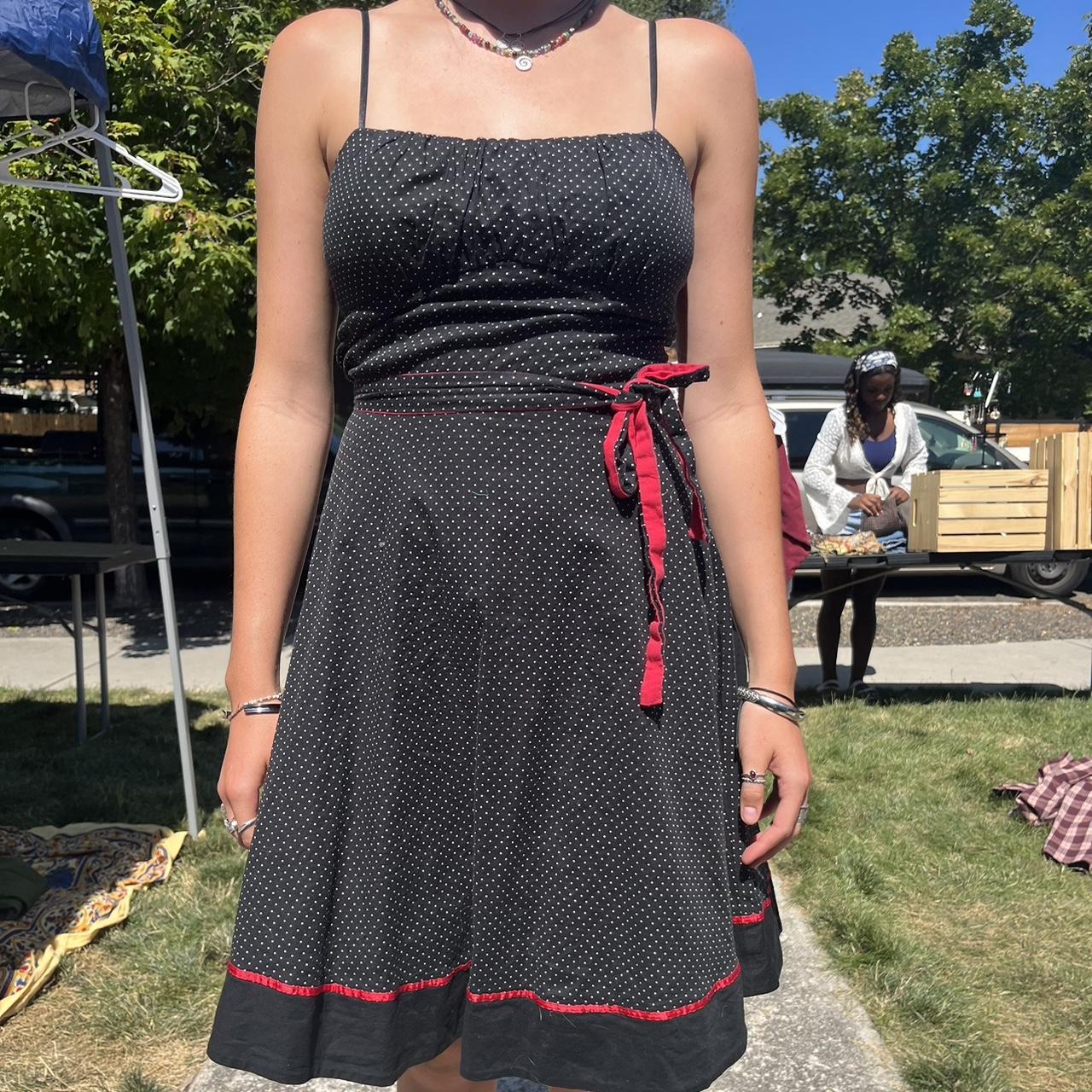 Black dress outlet with red ribbon