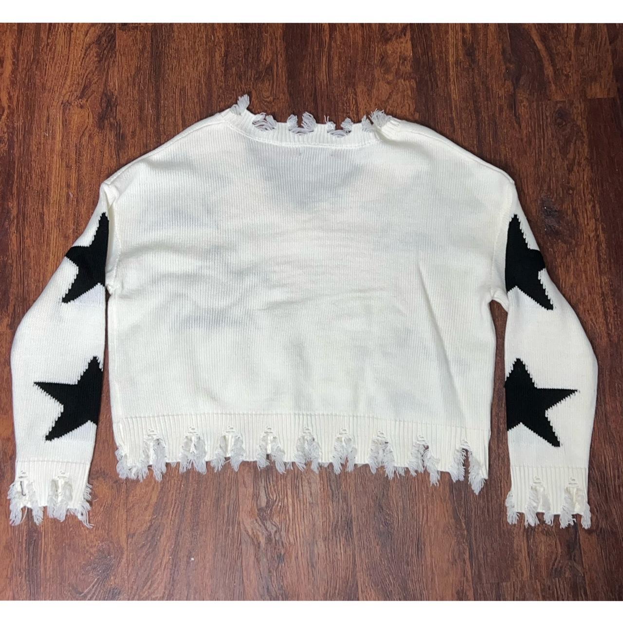 Star on sale ripped sweater