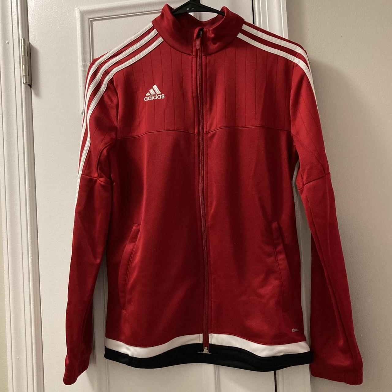 Earn your stripes in this iconic adidas track | Depop