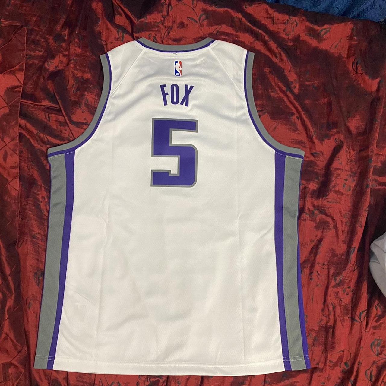 Brand new w/ tags De'Aaron Fox jersey 🔥 Size: Youth - Depop