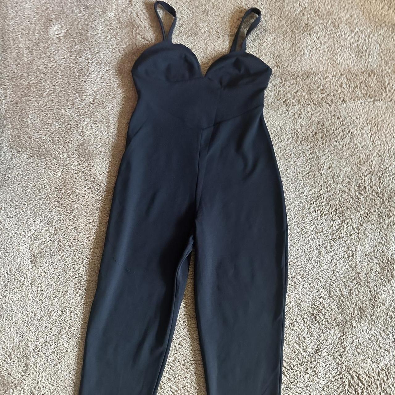 Black jumpsuit Never worn with outlet tags