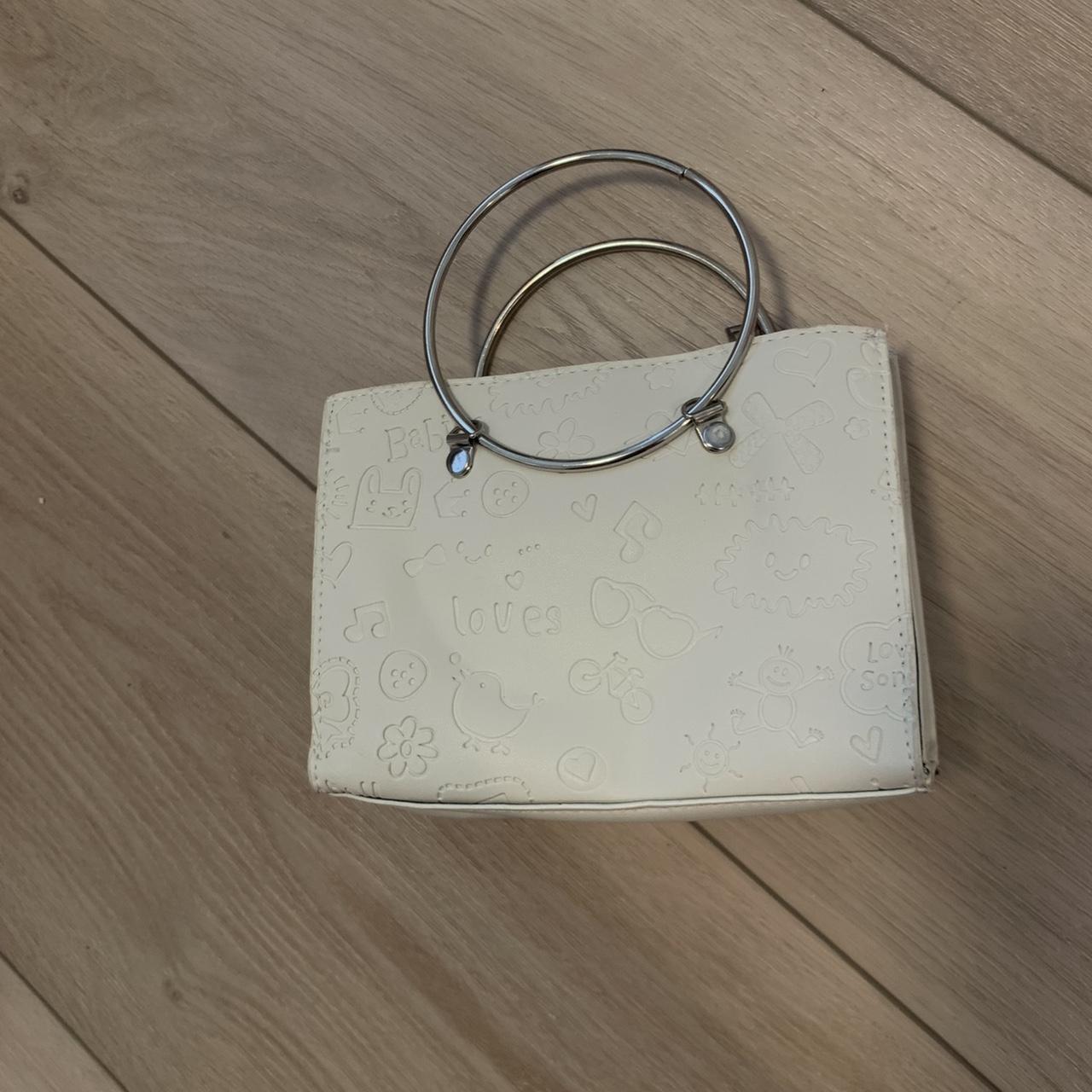 Small white purse with on sale handles