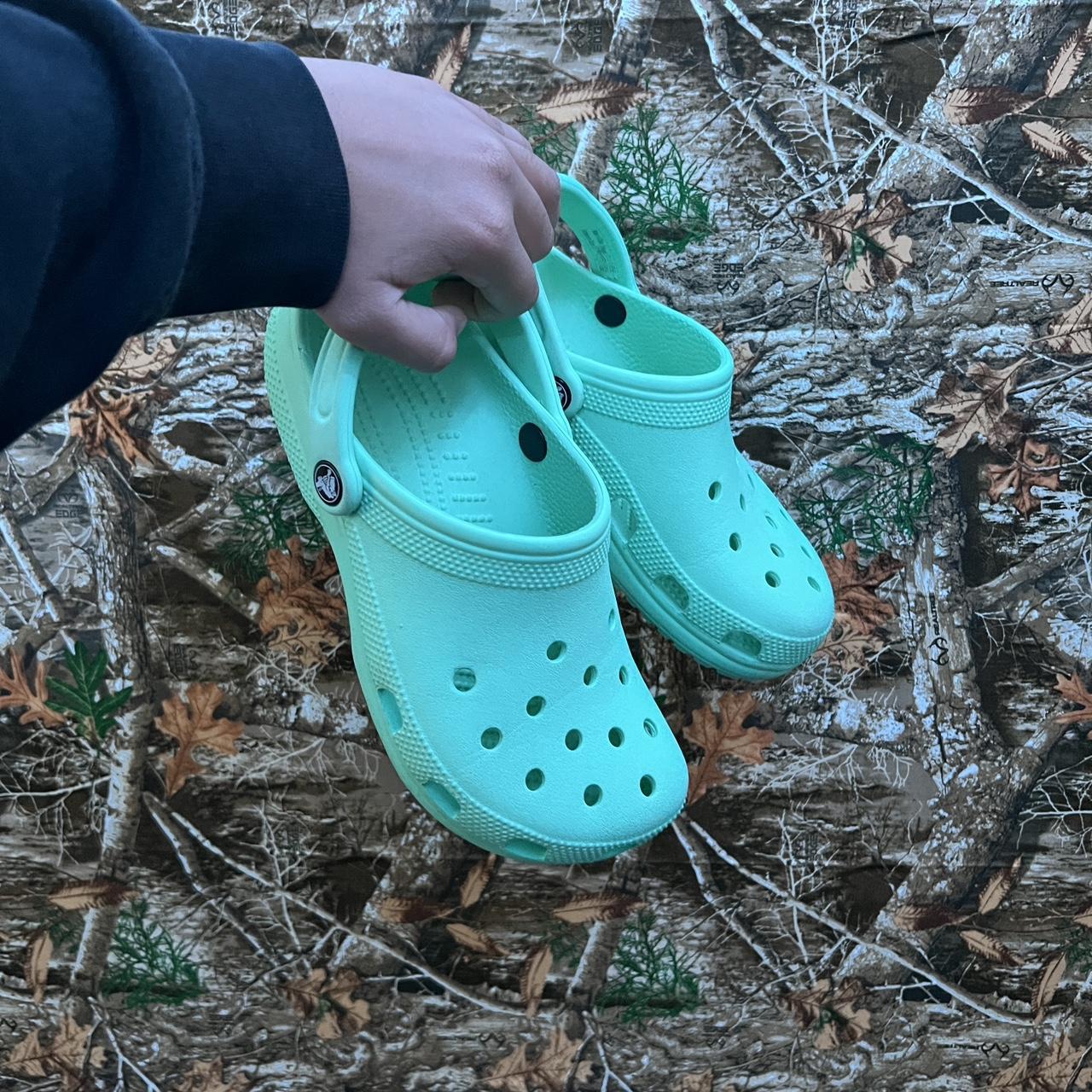 Mint color crocs Barley used Size 8 women s or size