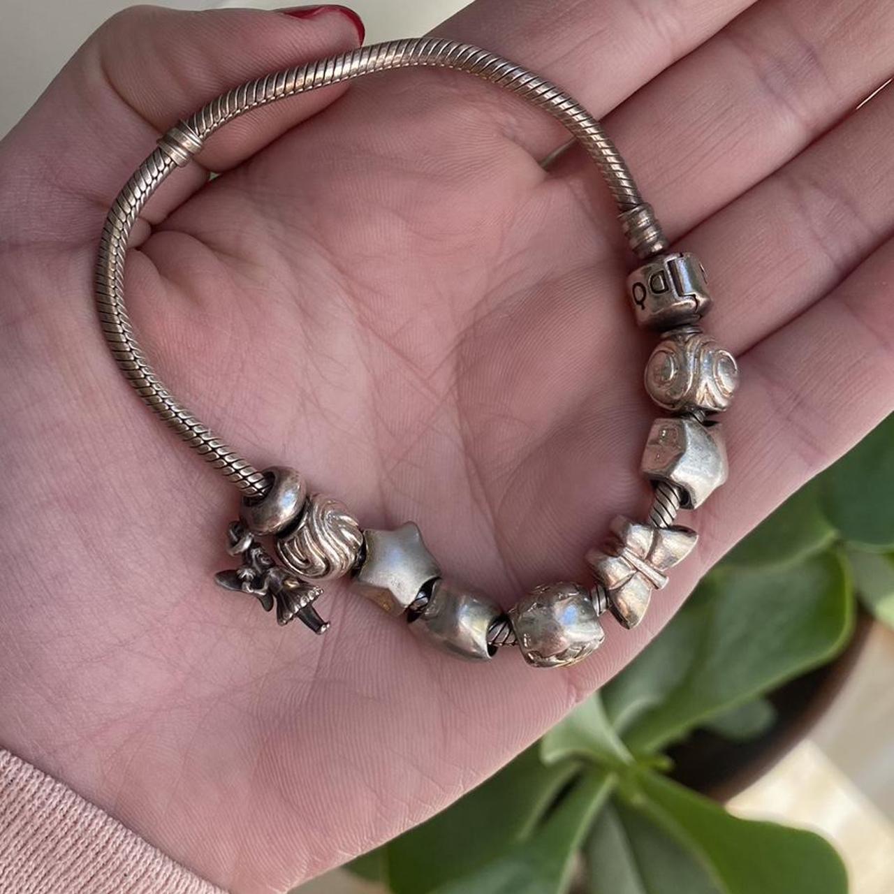 Silver pandora charm bracelet Real pandora 925... Depop