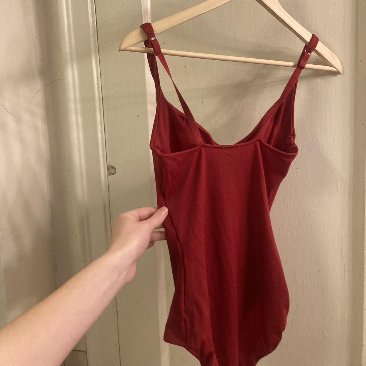 Wolford red body suit! built in bra. the material is