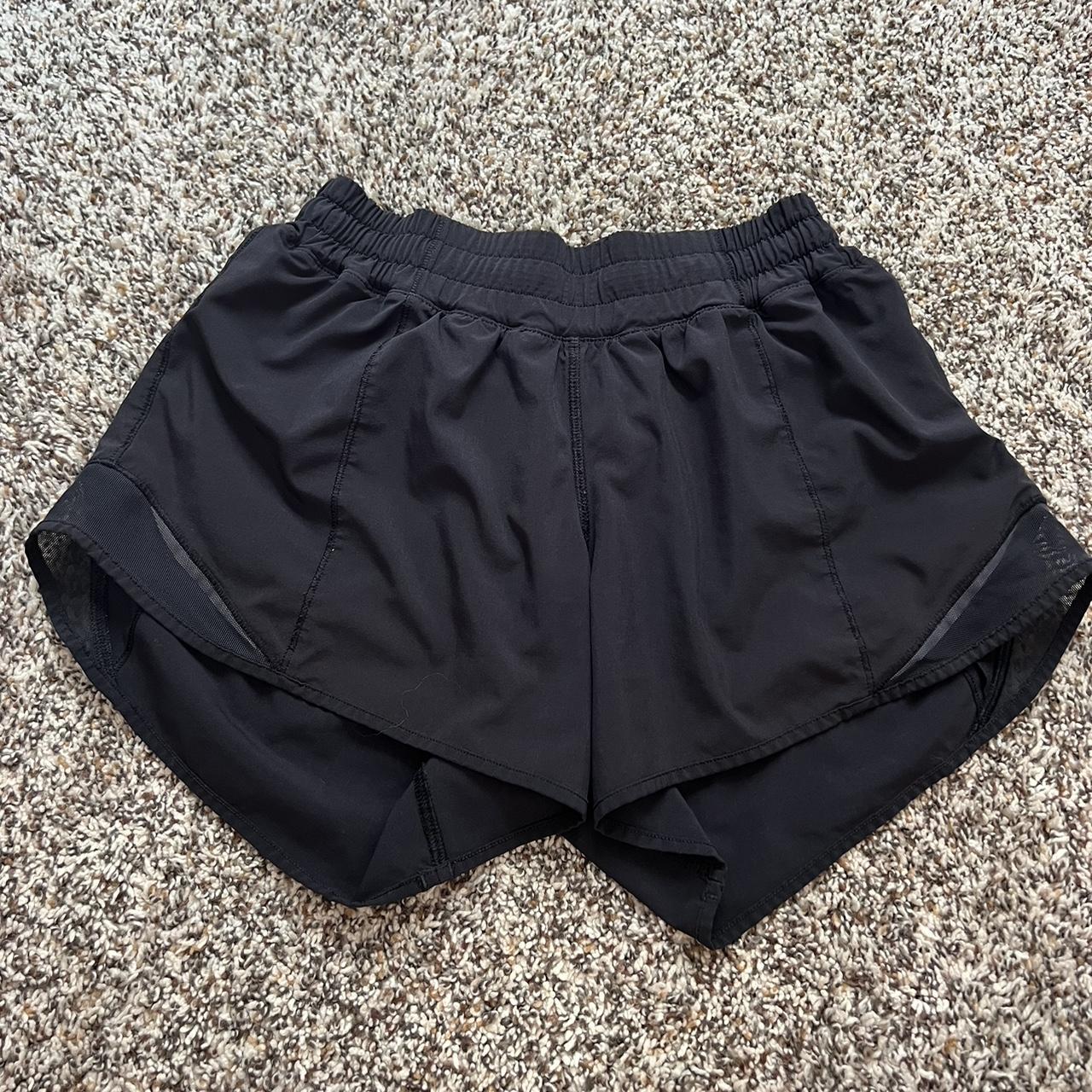 Black lululemon hotty hot shorts Size 4 Worn but... - Depop