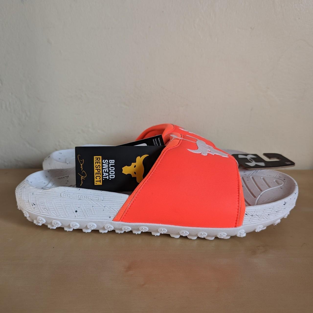 Orange under store armour slides