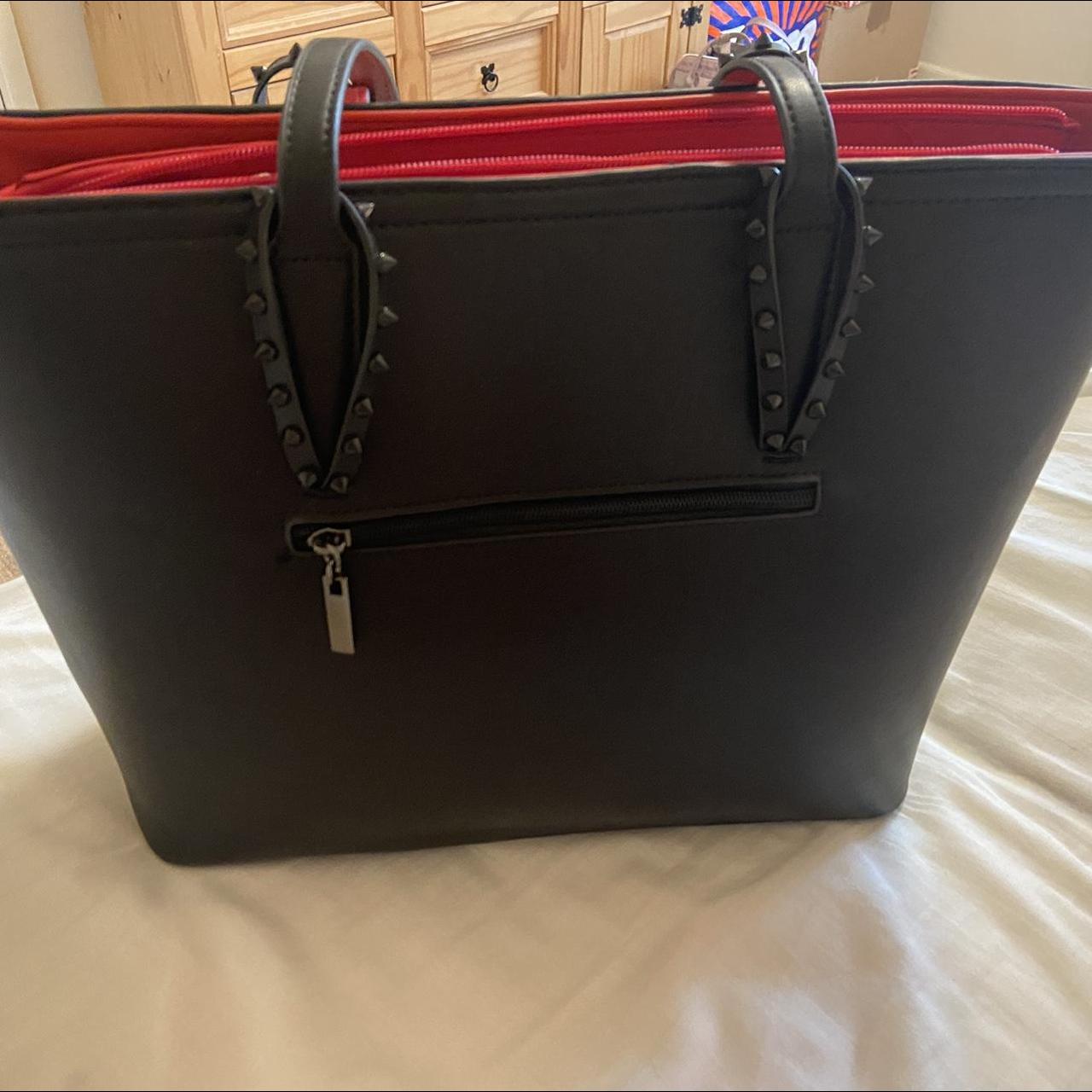 Black studded bag with red interior Depop