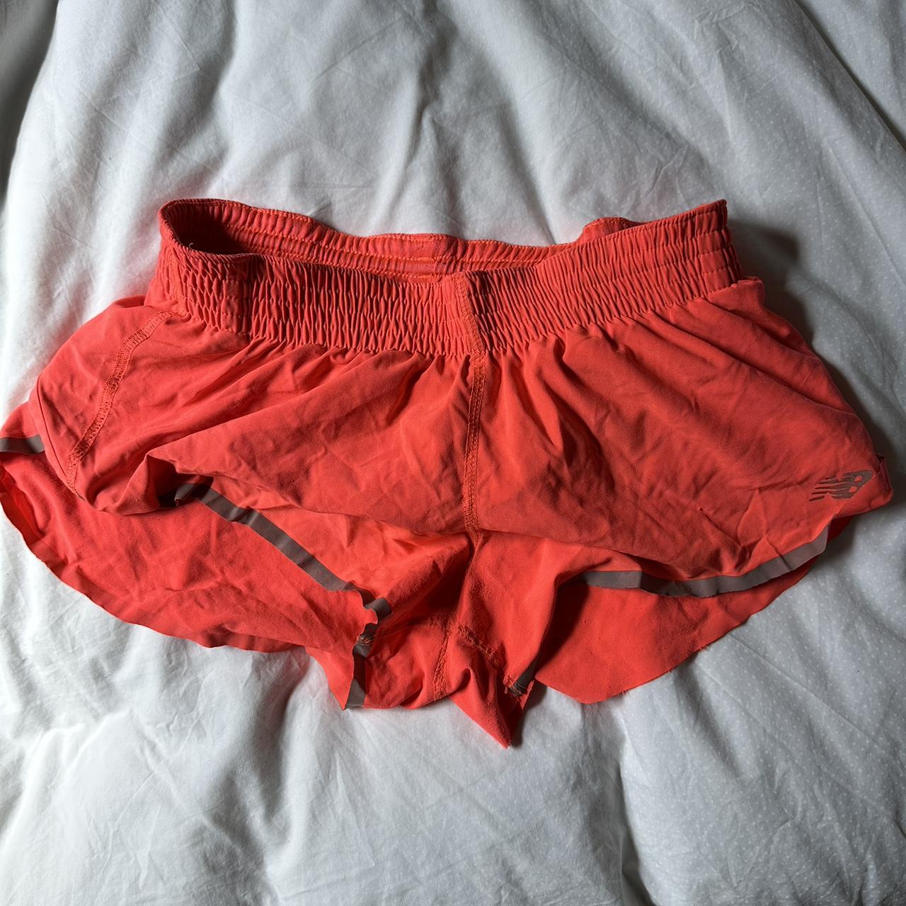 Orange new balance active shorts Size xs Depop