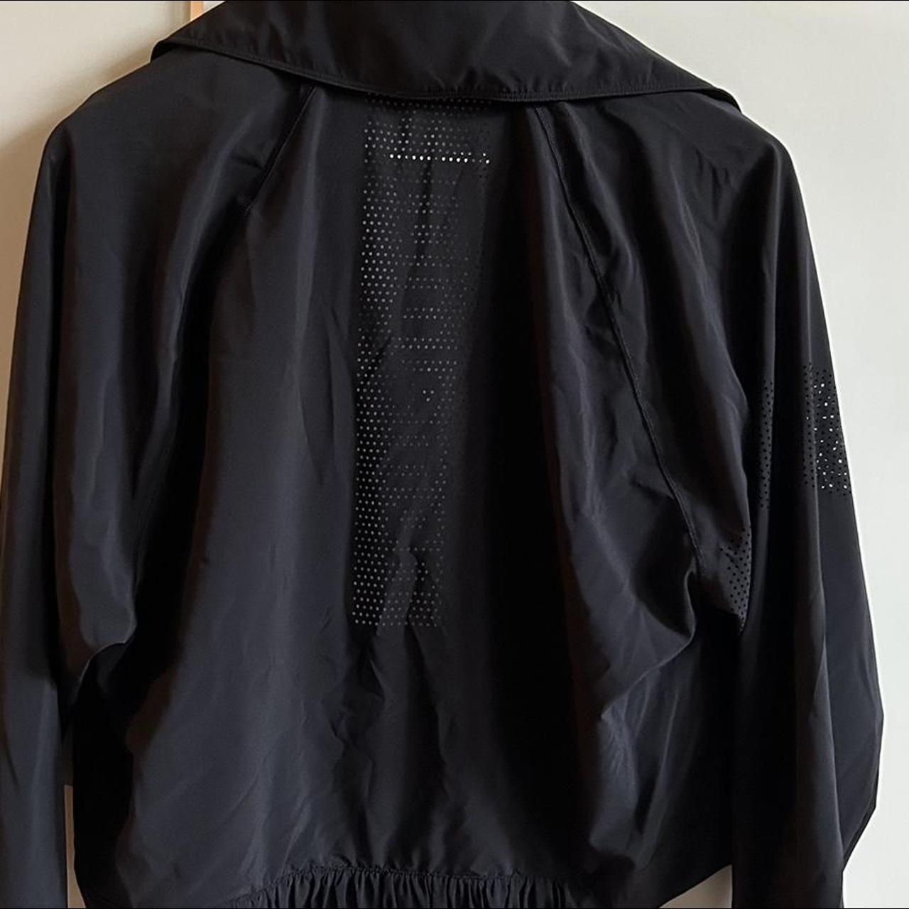 Lululemon black jacket with detail on the back -... - Depop