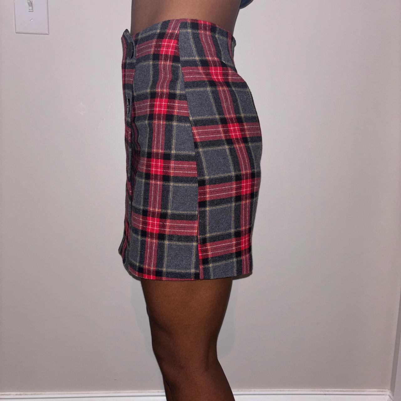 red and grey plaid skirt with button details,