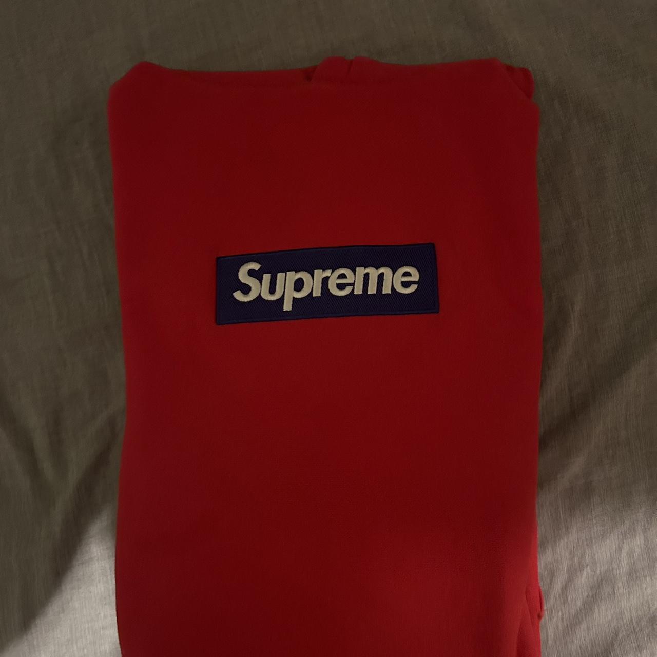 Red and cheap purple box logo