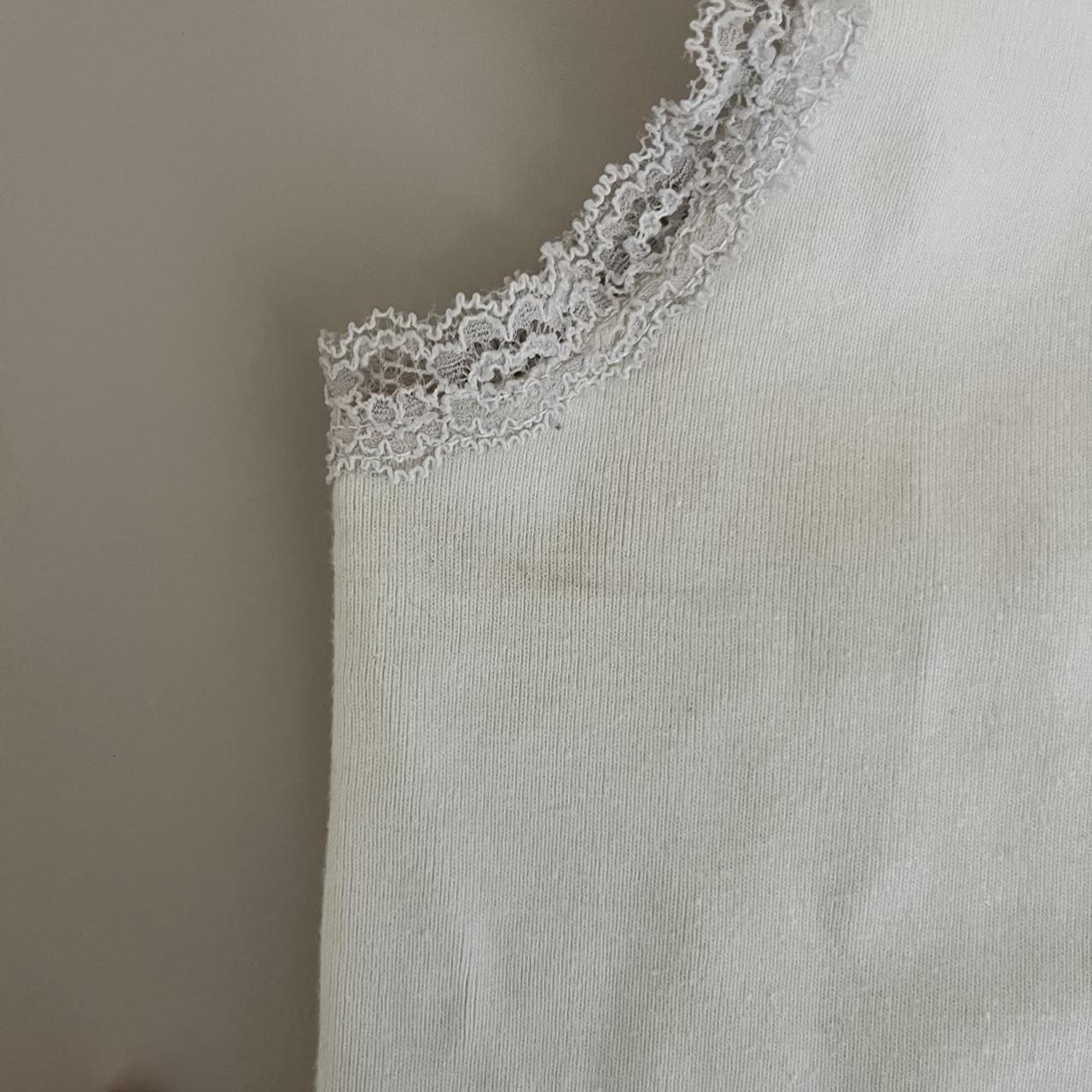 Brandy Melville kewpie tank! Has a few marks under... Depop