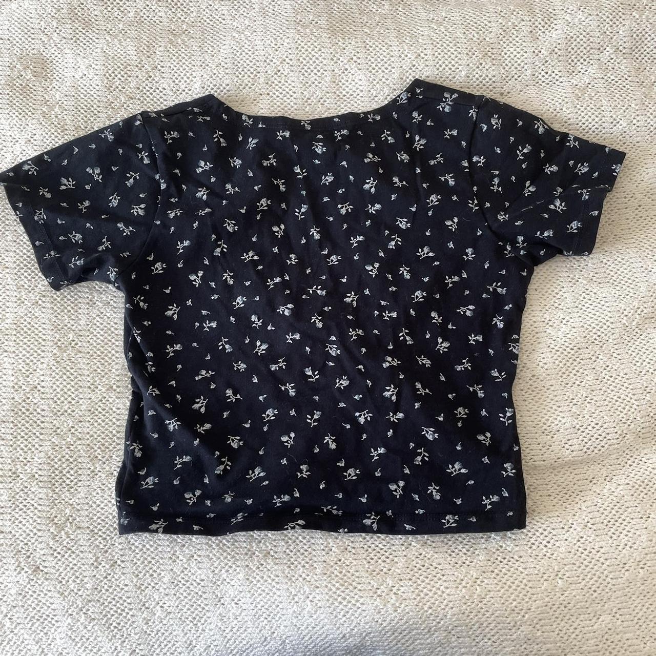 Brandy Melville navy blue floral Amara top Like new - Depop