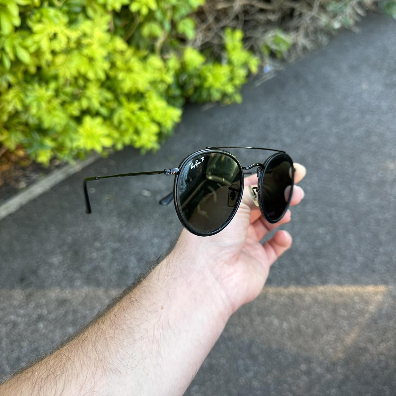 Ray Ban Round sunglasses Polarised Black frame. Depop