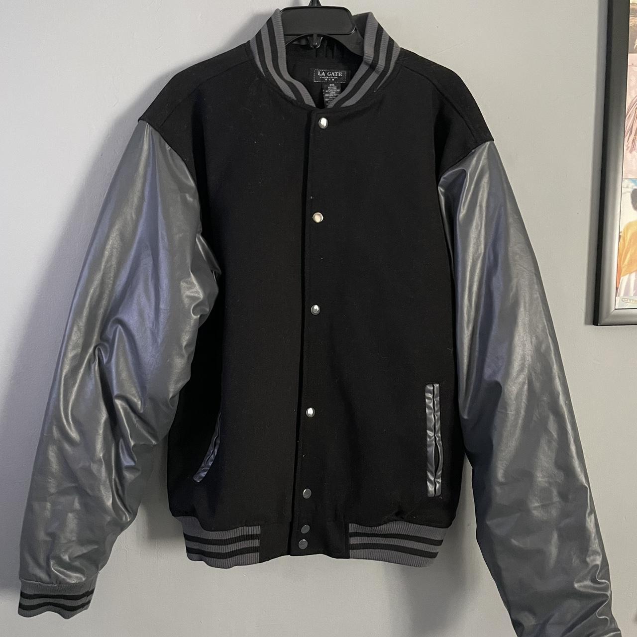 Black varsity jacket with leather sleeves perfect... - Depop