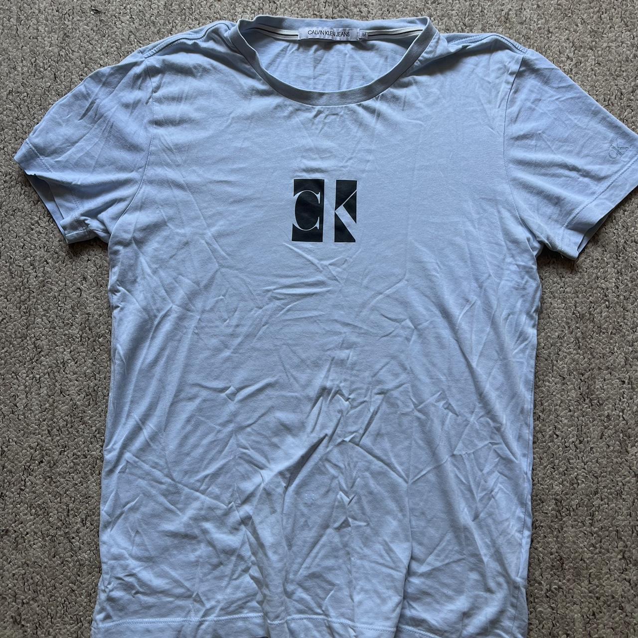 Calvin Klein Men's Blue and Black T-shirt | Depop