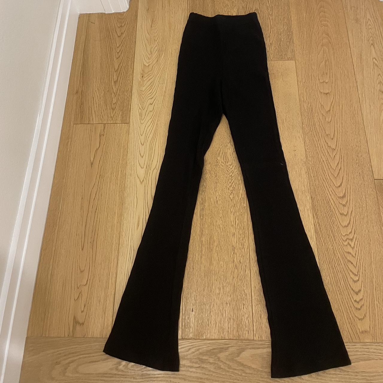 Missguided Tall ribbed flare trousers in black