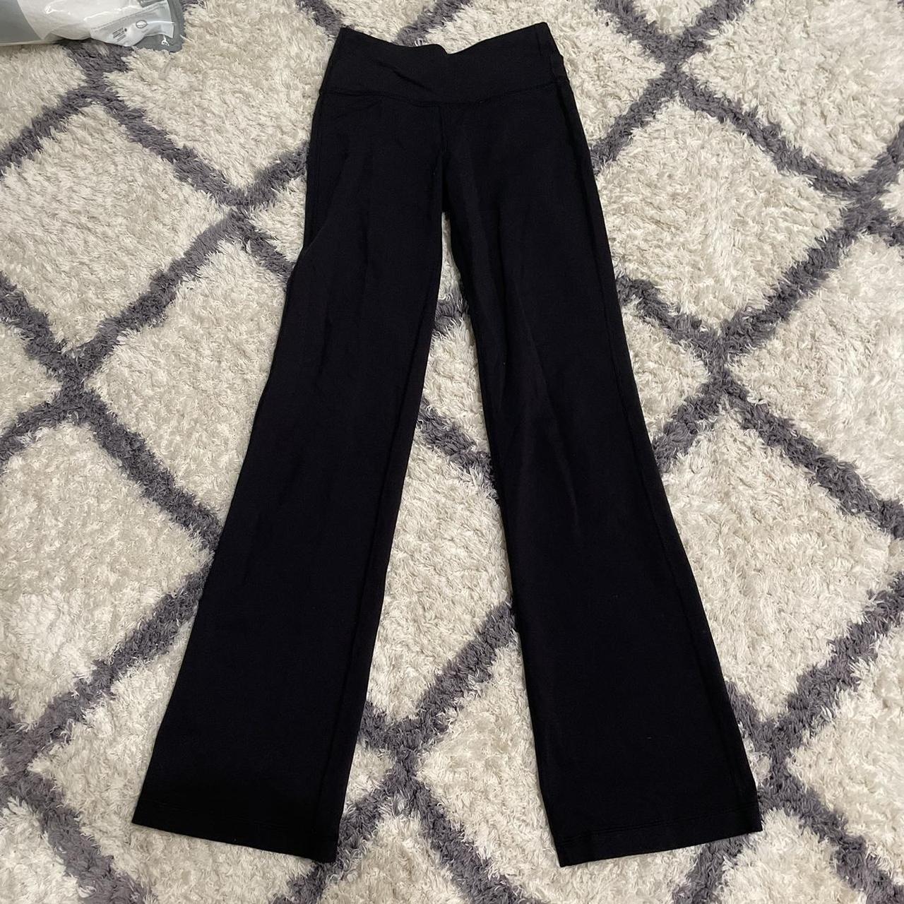 Lululemon low waisted flare pants w/cross waist... Depop